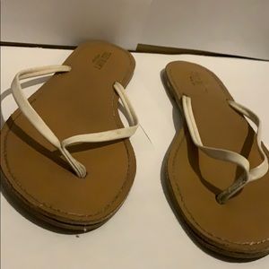 tan/white flip flops size 9